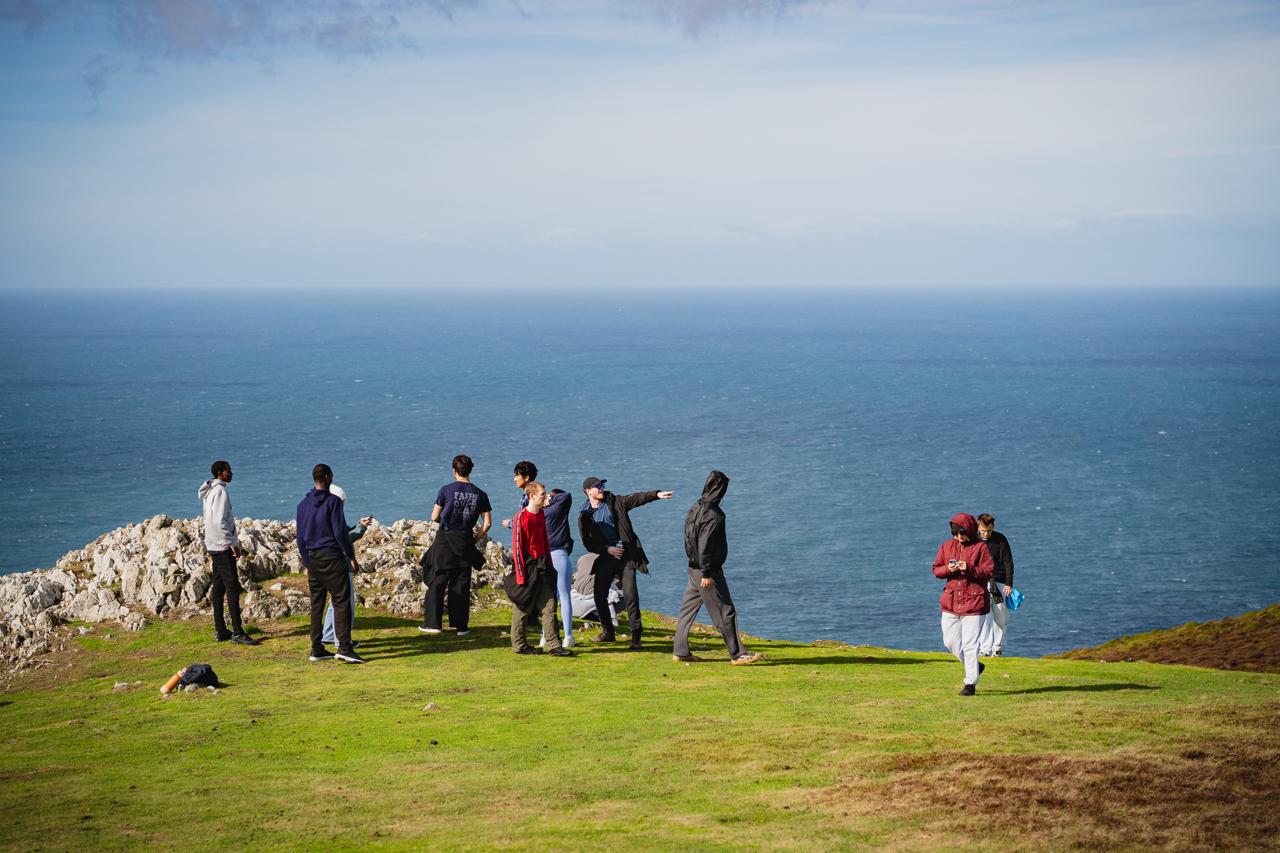 Students looking out over the sea