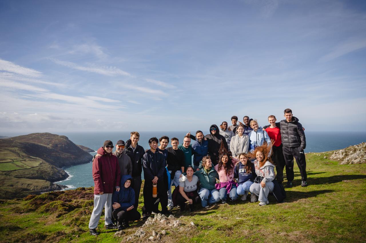 Newbold students gathered on the Welsh coast