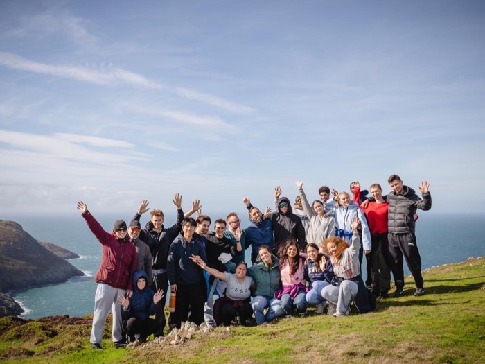 Newbold students together on the Welsh coast at Aberdaron